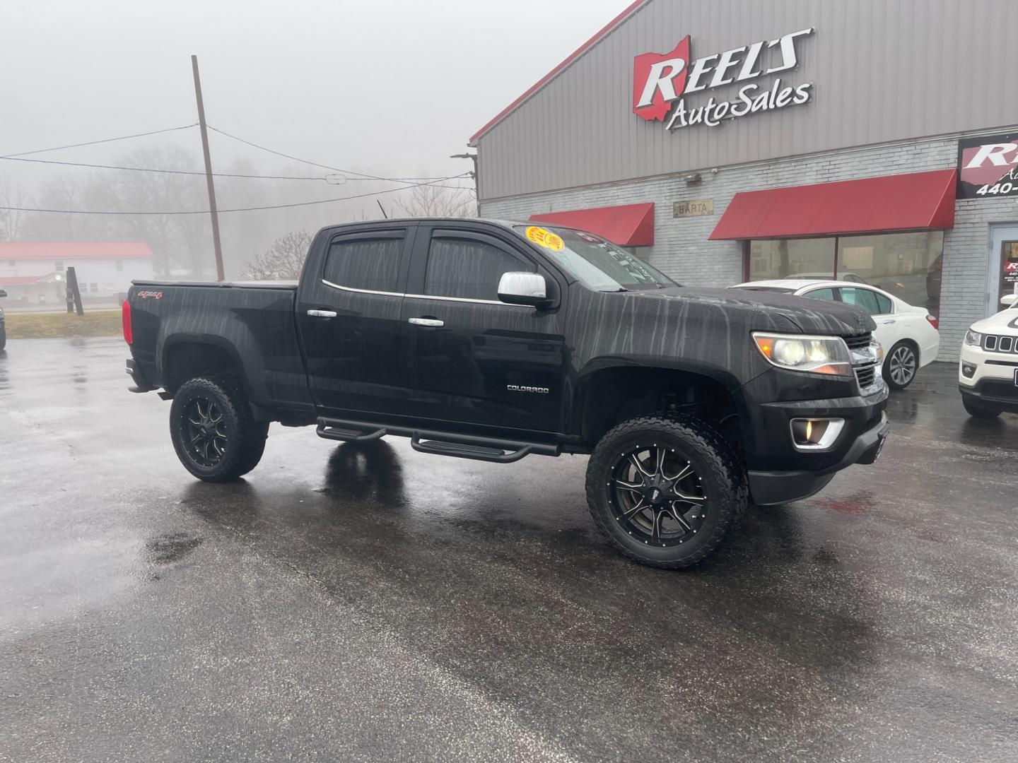 2016 Black /Black Chevrolet Colorado LT Crew Cab 4WD (1GCGTCE36G1) with an 3.6L V6 DOHC 24V engine, 6 Speed Automatic transmission, located at 547 E. Main St., Orwell, OH, 44076, (440) 437-5893, 41.535435, -80.847855 - Photo#3